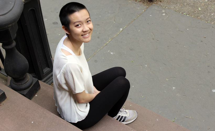 Lack of Car Not Deterring Woman From Taking Free Bumper Sticker
