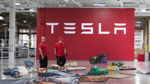 Tesla Employees Scramble To Make Office Look Like They’ve Been Sleeping There