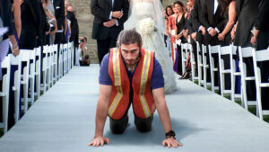 Bezos Wedding Guests Delighted By Amazon Worker With Ring Tied To Collar Crawling Down Aisle 